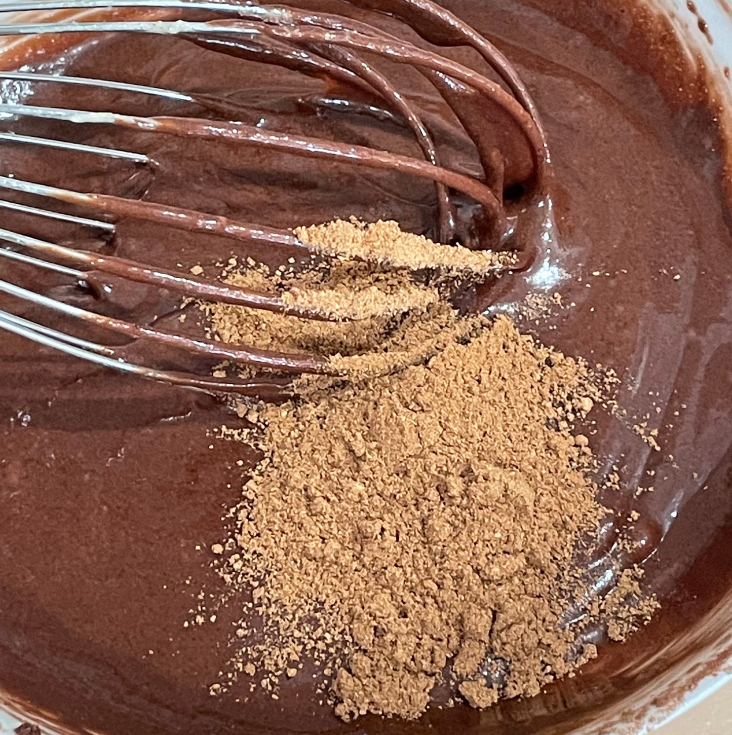 Adding gingerbread spice to cake batter